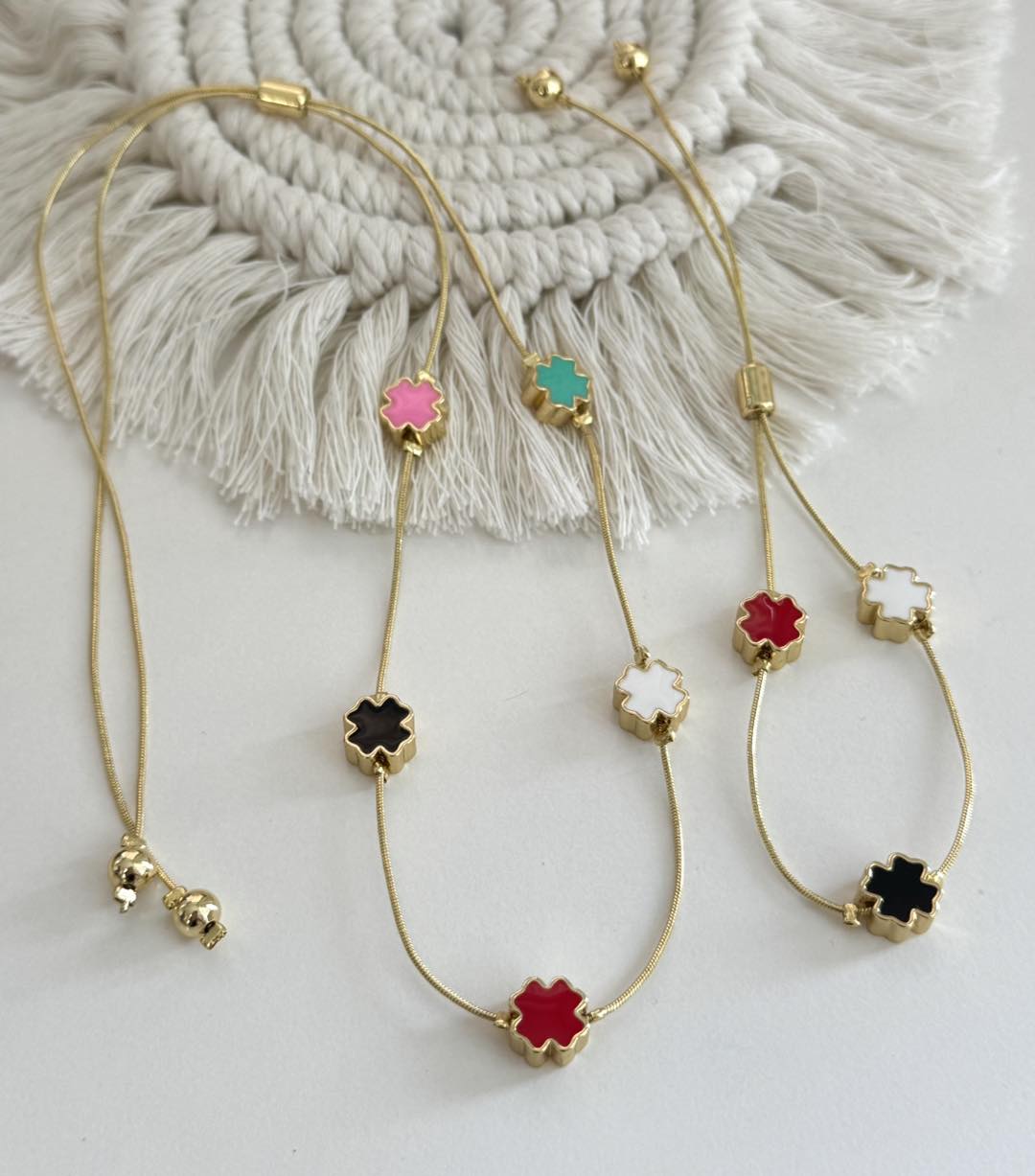 Minimalist gold chain and bracelet on model